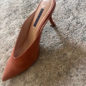 Stuart Weitzman Lulah Mid-Heel Terracotta slip on mules.